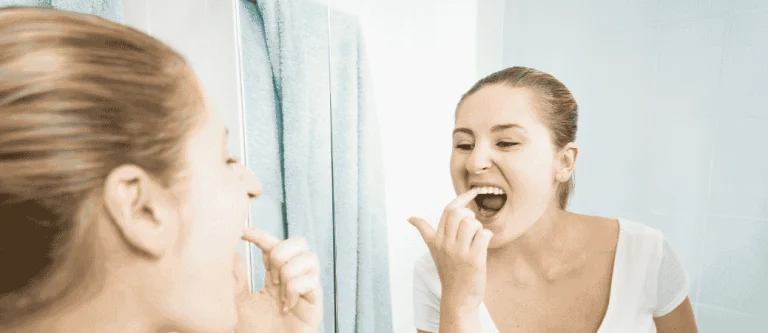food stuck between teeth